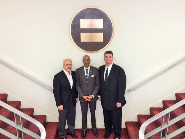 Levon Kirakosian, Nolan V. Rollins and Ashod Mooradian together at the offices of the Los Angeles Urban League