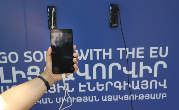 The solar-powered bus stops are equipped with mobile device charging stations