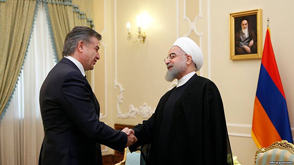 Karen Karapetian with Iranian President Rouhani (Photo: Press Office of the Government of Armenia)