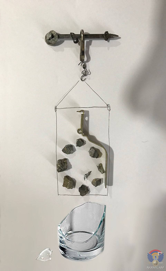 Artsakh Defense Armyuncovered that a hand grenade embedded in an ordinary drinking glass was used by an Azerbainani dronel (Photo: Artsakh Defense Ministry)
