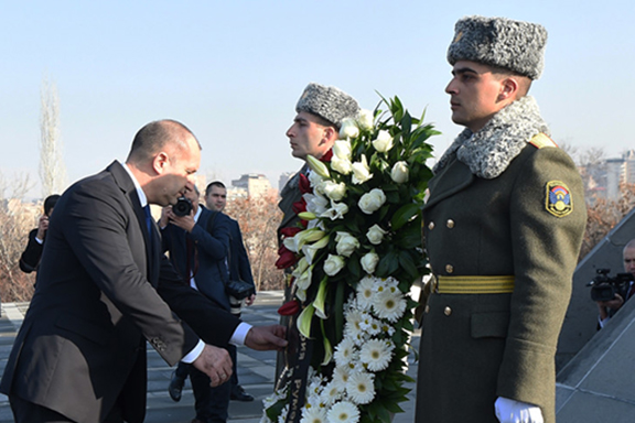 Bulgaria's President Rumen Radev lays a wreath at Dzidzernagapert on Monday