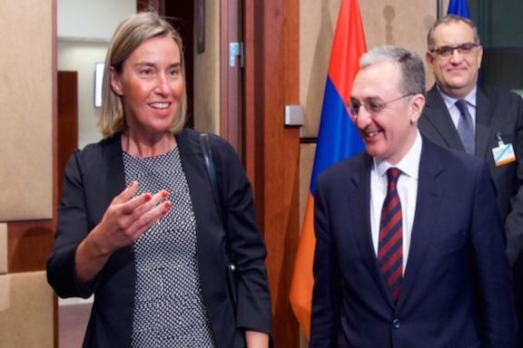Mogherini and Mnatsakanian arrive for a meeting of the EU-Armenia Partnership Council in Brussels.