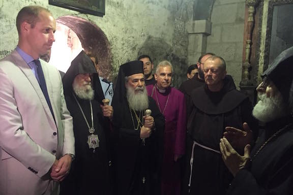 Prince William with the Armenian Patriarch of Jerusalem and other religious leaders inside the church.