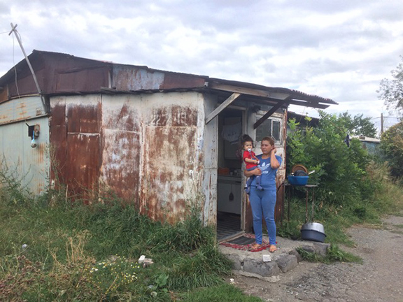 Shushanik with her One and half year old daughter at the door of their Domik