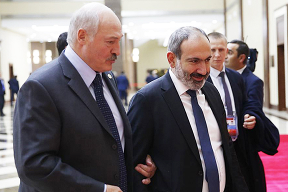Belarus President Alexander Lukashenko (left) with Prime Minister Nikol Pashinyan at a CSTO summit Astana in November 2018