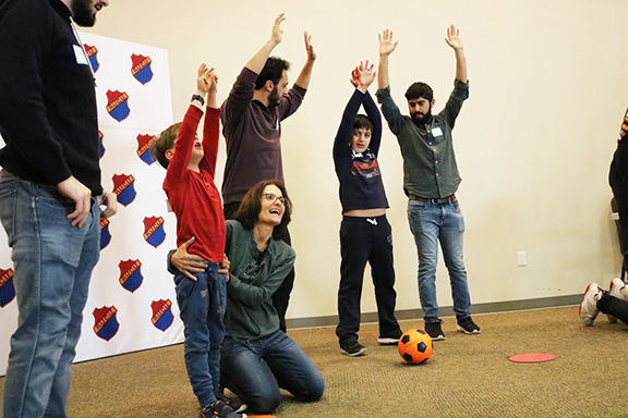 Anahid Magdesian providing a hands on training with the Homenetmen Hrashq athletes