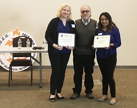 Hayley Peck (left) and Rosaura Espinoza (right) form Autism Spectrum Therapies presented with a certificate of appreciation by Aram Bekarian