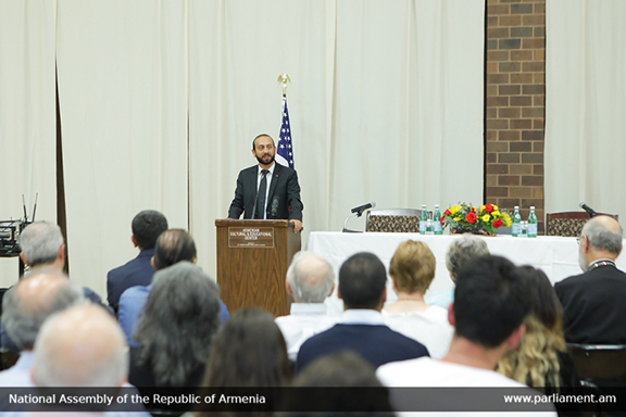 Ararat Mirzoyan speaking at town hall meeting, Watertown, Mass.