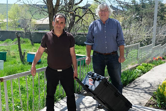 Garik Degoyan (left) taking possession of PVDL in Kavar from Dr. James