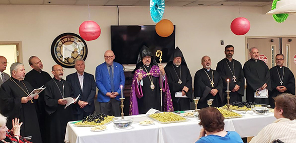 Western Prelate Archbishop Moushegh Mardirossian blessing the grapes