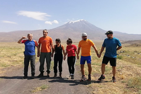 Meghri dancing with her fellow climbers before beginning their trek